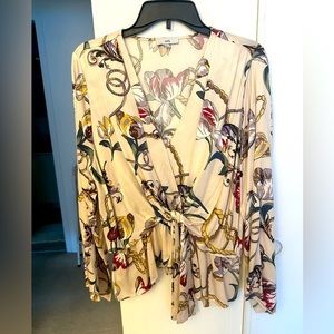 Worn once! Trendy dressy V blouse. Angled front with tie. Wide sleeve.